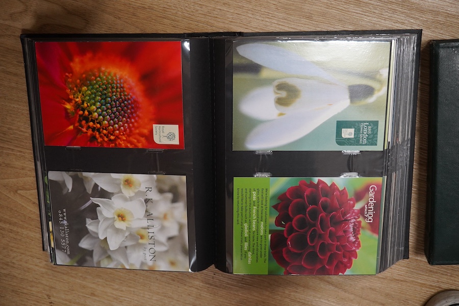 A quantity of various post cards arranged in three albums to include botanical interest. Condition - fair